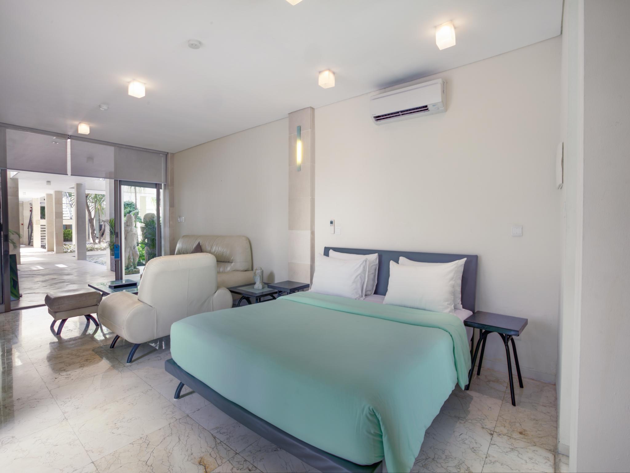 ホテル フラマ エクスクルーシブ オーシャン ビーチ スミニャック バリ レギャン エクステリア 写真 A bedroom in the hotel