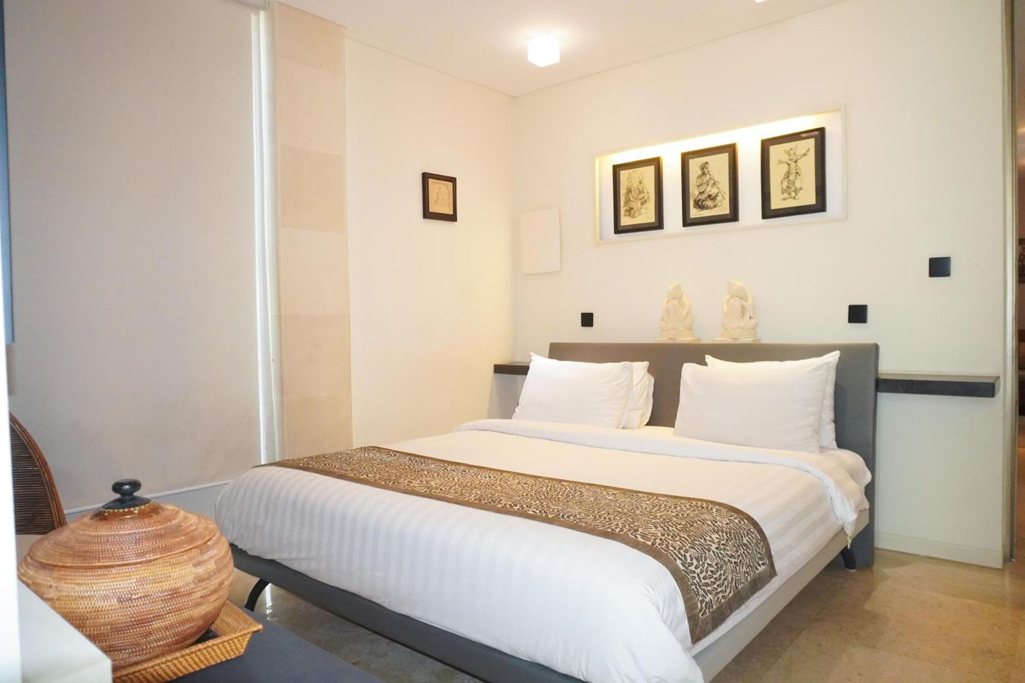 ホテル フラマ エクスクルーシブ オーシャン ビーチ スミニャック バリ レギャン エクステリア 写真 A bedroom at the hotel